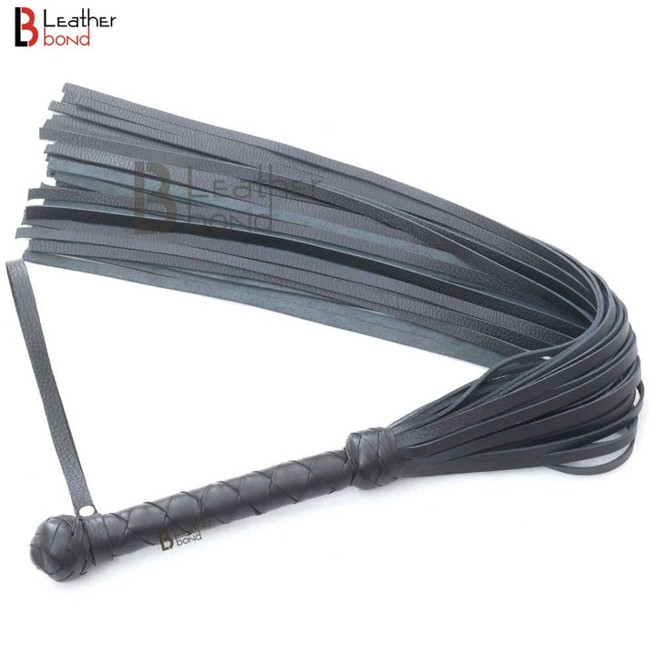 Full view of black BDSM flogger whip with 25 wide leather falls and steel-reinforced handle, ideal for intense flogger spanking and flogger sex.