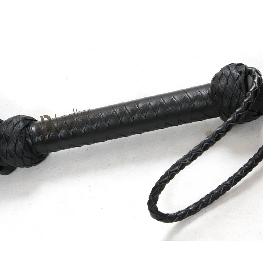 Braided leather handle with wrist loop on a BDSM flogger whip, crafted for firm control and effective flogger spanking or flogger sex scenes