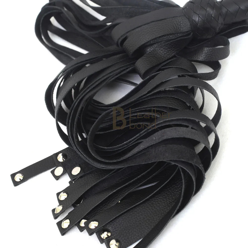 studded leather falls on a BDSM flogger whip, designed for sharp flogger spanking and precision in flogger sex scenes