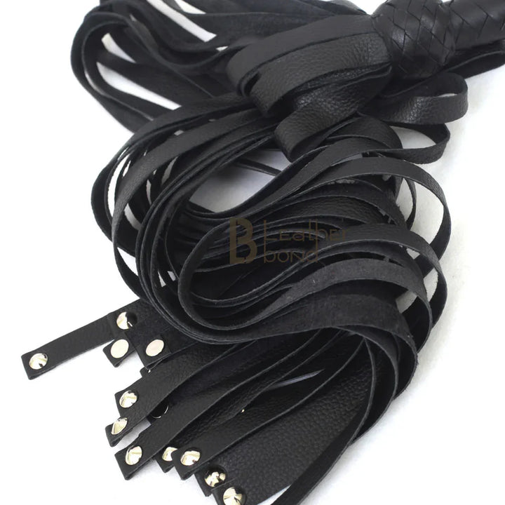 studded leather falls on a BDSM flogger whip, designed for sharp flogger spanking and precision in flogger sex scenes