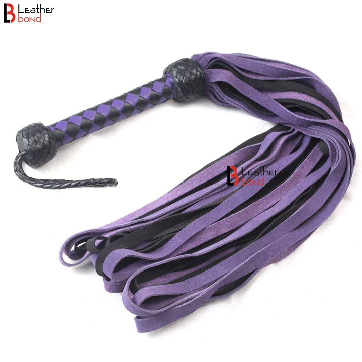 Full view of purple and black suede leather flogger with 50 loop-style falls, handmade for BDSM flogger spanking and thuddy impact play