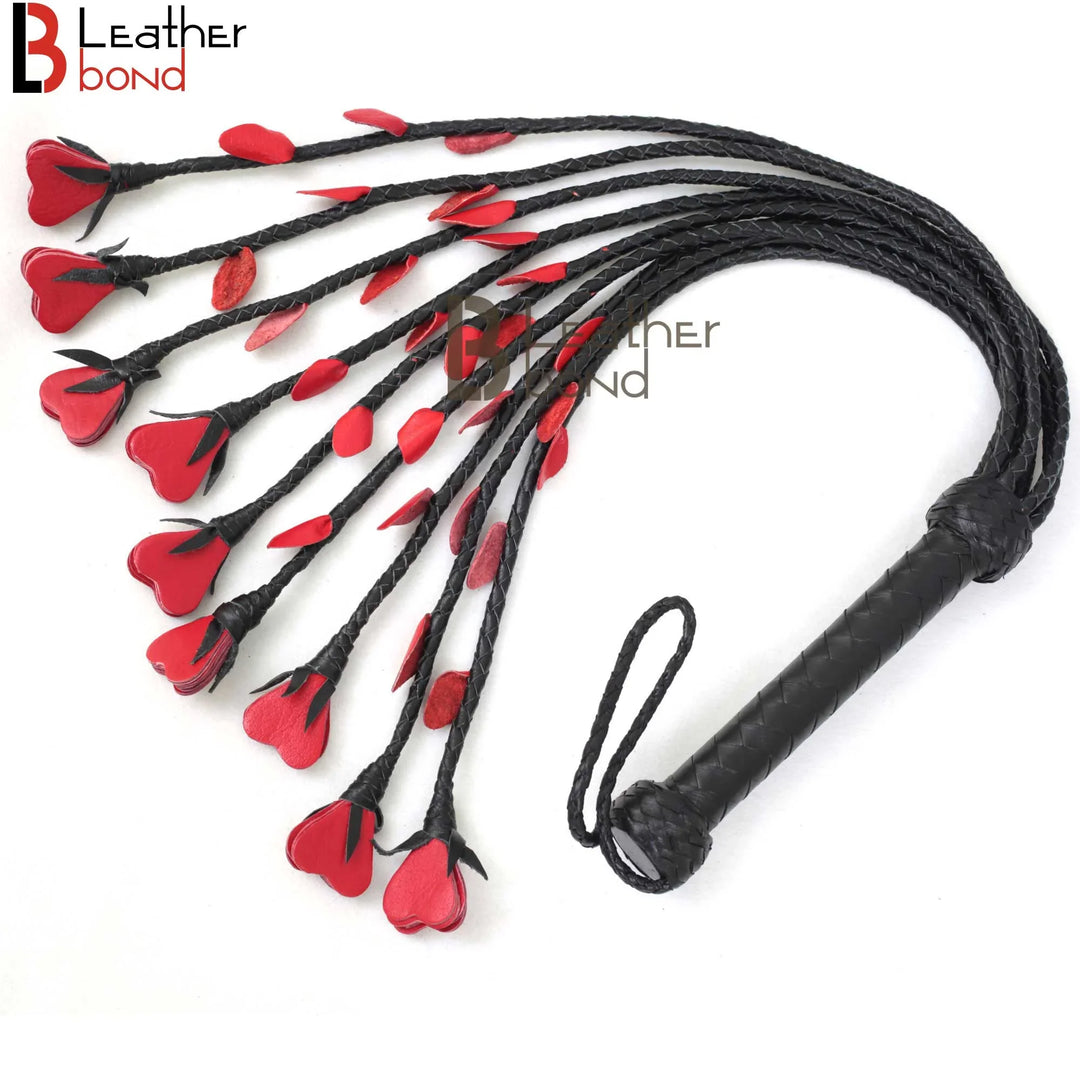 Full view of red heart leather BDSM flogger whip with 9 braided falls, ideal for flogger spanking and romantic flogger sex scenes.